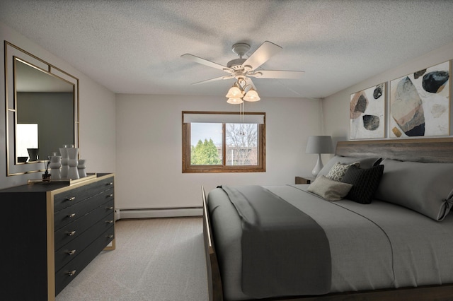 bedroom featuring a ceiling fan, a baseboard heating unit, a textured ceiling, and light colored carpet
