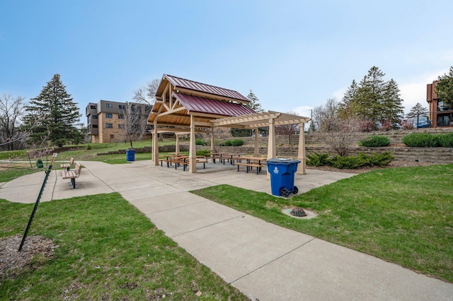 surrounding community featuring a gazebo, a pergola, and a yard