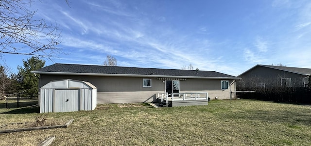 606 Tenth St W, Park Rapids, MN 56470 - rear view of property with a shed, a deck, and an outdoor structure