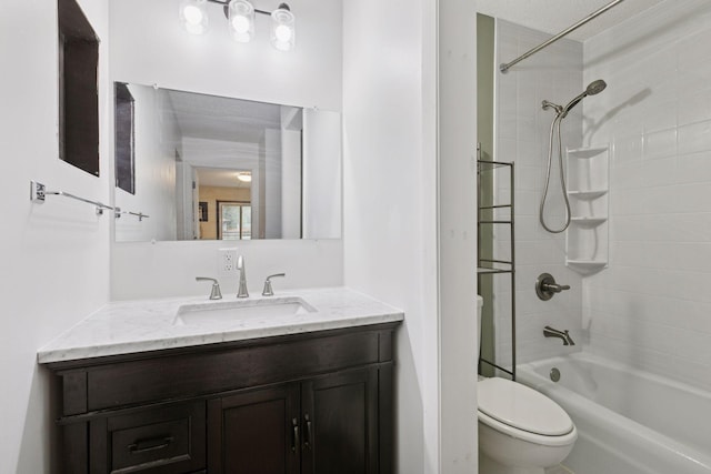 bathroom with vanity, toilet, and shower / washtub combination