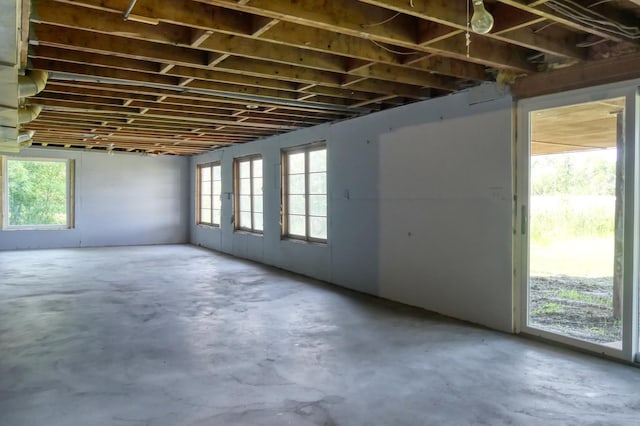 12056 Everton Ave N, Hugo, MN 55110 - misc room featuring concrete floors and plenty of natural light