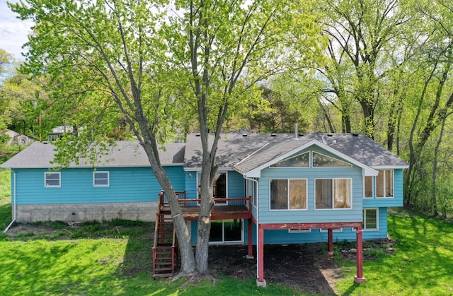 12056 Everton Ave N, Hugo, MN 55110 - rear view of house with a wooden deck, stairway, a shingled roof, and a yard