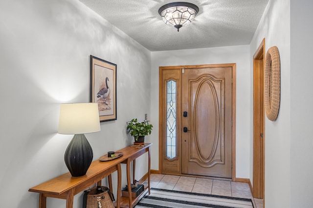 1171 County Rd E, Scott Twp, WI 54801 - entryway featuring baseboards, light tile patterned flooring, and a textured ceiling