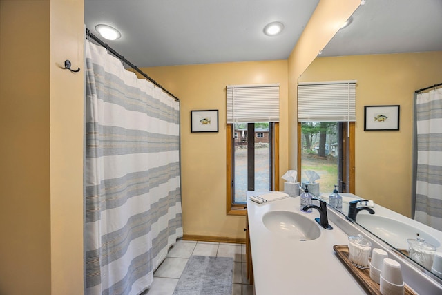 1171 County Rd E, Scott Twp, WI 54801 - full bathroom with tile patterned floors, vanity, and curtained shower