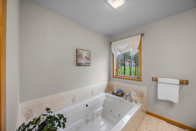 1171 County Rd E, Scott Twp, WI 54801 - bathroom with tile patterned floors, visible vents, baseboards, and a jetted tub