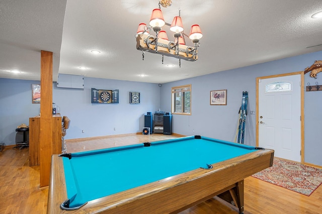 1171 County Rd E, Scott Twp, WI 54801 - game room with a notable chandelier, a textured ceiling, recessed lighting, baseboards, and wood finished floors