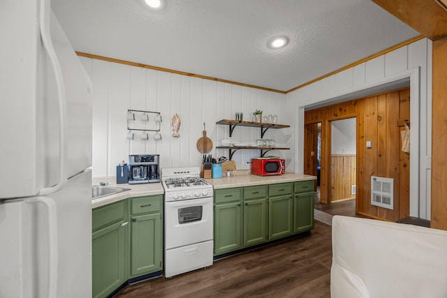 1171 County Rd E, Scott Twp, WI 54801 - kitchen with open shelves, heating unit, white appliances, light countertops, and green cabinets