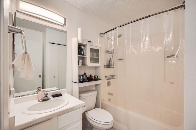 bathroom with toilet, a textured ceiling, shower / bath combo, and vanity