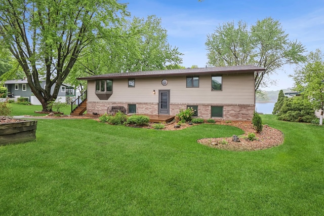 2060 Donnelly Dr NW, Maple Lake Twp, MN 55313 - view of front of home featuring a front lawn and brick siding