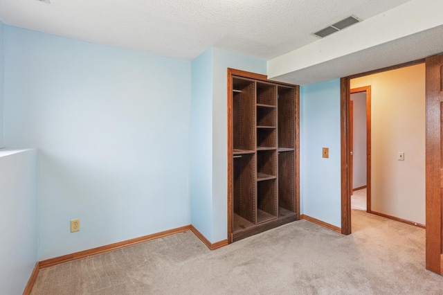 2060 Donnelly Dr NW, Maple Lake Twp, MN 55313 - unfurnished bedroom featuring carpet floors, baseboards, and a textured ceiling