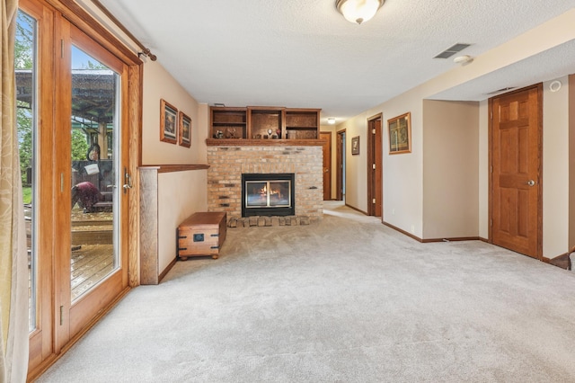 2060 Donnelly Dr NW, Maple Lake Twp, MN 55313 - unfurnished living room featuring carpet flooring, a fireplace, baseboards, and a textured ceiling