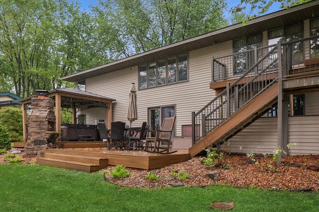 2060 Donnelly Dr NW, Maple Lake Twp, MN 55313 - back of property with a gazebo, stairs, a lawn, and a deck