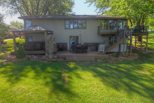 2060 Donnelly Dr NW, Maple Lake Twp, MN 55313 - back of house featuring a gazebo, a wooden deck, stairs, and a lawn