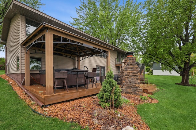 2060 Donnelly Dr NW, Maple Lake Twp, MN 55313 - view of patio / terrace with a hot tub, a gazebo, and a deck