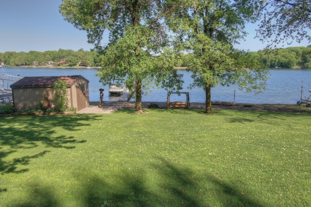 2060 Donnelly Dr NW, Maple Lake Twp, MN 55313 - view of grassy yard with a water view and a boat dock