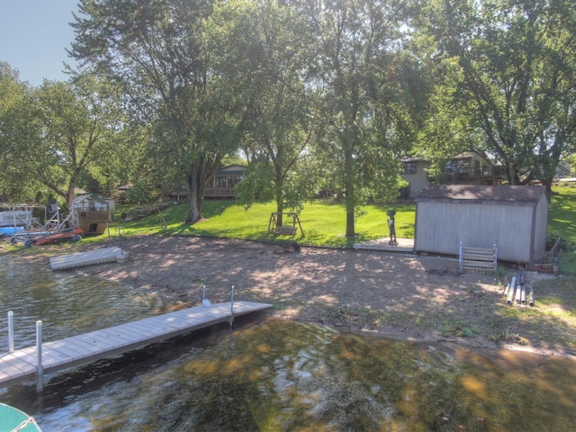 2060 Donnelly Dr NW, Maple Lake Twp, MN 55313 - dock area with a yard and a water view