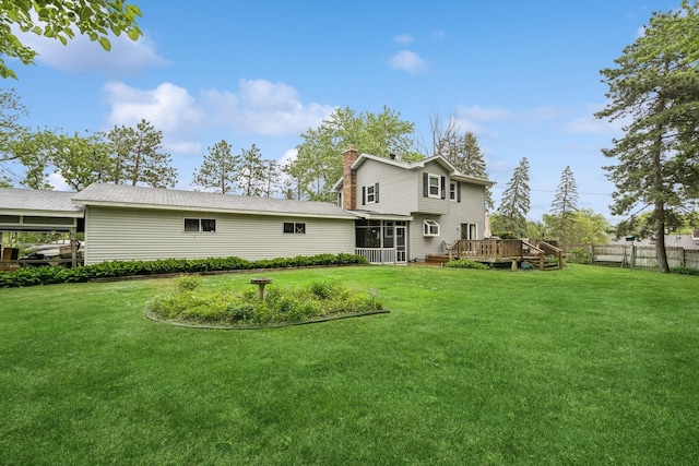 18701 Delton Ave, Minnetonka, MN 55345 - rear view of property featuring a chimney, a deck, and a sunroom
