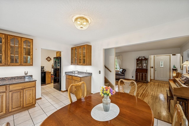 18701 Delton Ave, Minnetonka, MN 55345 - dining space featuring stairway, light tile patterned flooring, and baseboards