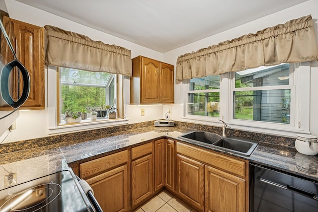 18701 Delton Ave, Minnetonka, MN 55345 - kitchen featuring dishwasher, a sink, brown cabinetry, and healthy amount of natural light