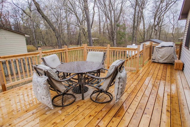deck featuring outdoor dining space