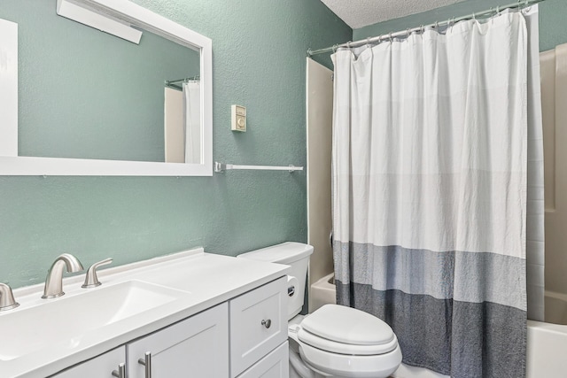 221 Grand Ave W Unit 111, South Saint Paul, MN 55075 - bathroom featuring shower / bathtub combination with curtain, a textured wall, toilet, and vanity