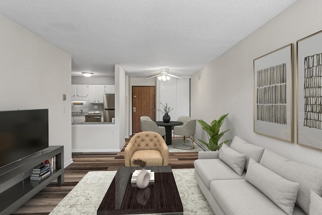 221 Grand Ave W Unit 111, South Saint Paul, MN 55075 - living room featuring dark wood finished floors, ceiling fan, and a textured ceiling