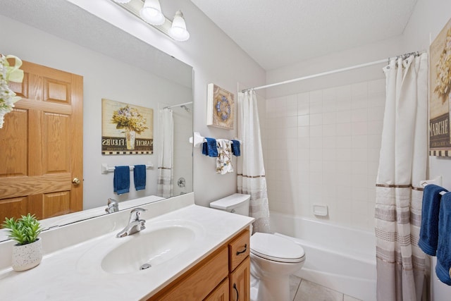 bathroom featuring vanity, tile patterned floors, shower / bath combo with shower curtain, and toilet