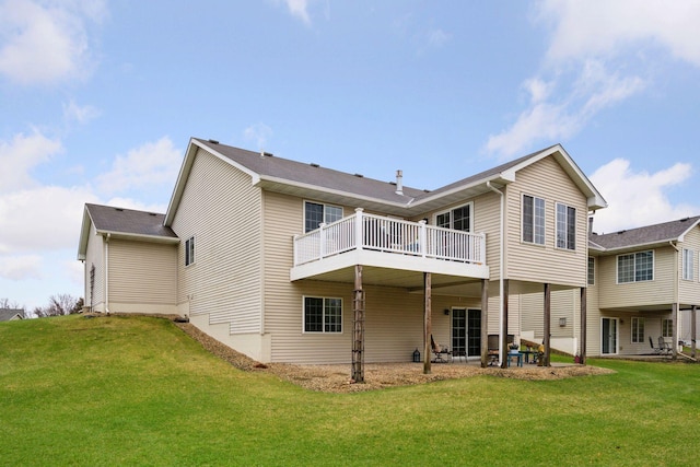 back of house with a yard and a deck