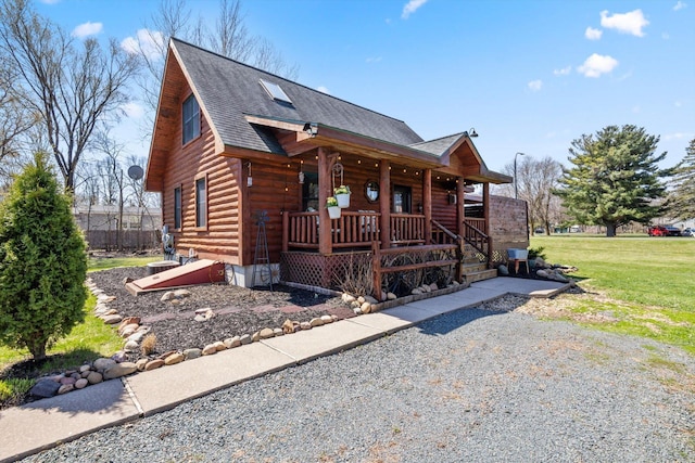 510 State Rd Unit 35, Centuria, WI 54024 - log home with a porch and roof with shingles