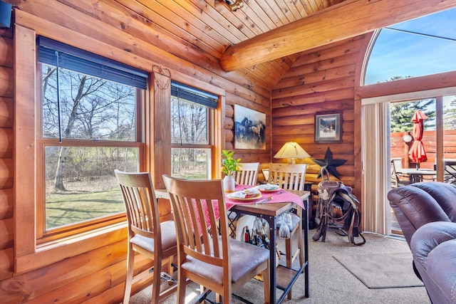 510 State Rd Unit 35, Centuria, WI 54024 - dining space with a healthy amount of sunlight, log walls, and vaulted ceiling with beams