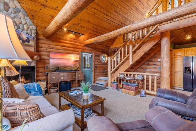 510 State Rd Unit 35, Centuria, WI 54024 - living area with carpet, stairs, wooden ceiling, and a large fireplace