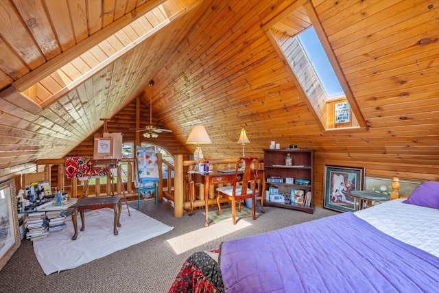 510 State Rd Unit 35, Centuria, WI 54024 - bedroom with wooden walls, carpet floors, and vaulted ceiling with skylight