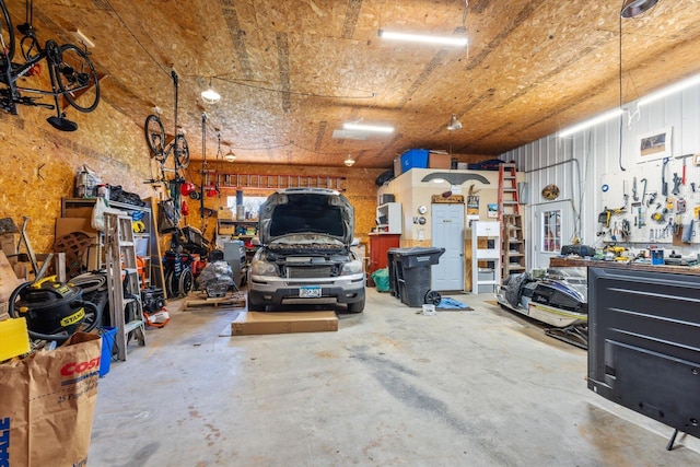 510 State Rd Unit 35, Centuria, WI 54024 - garage with a workshop area