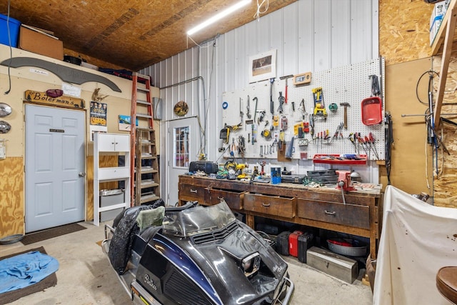 510 State Rd Unit 35, Centuria, WI 54024 - garage featuring a workshop area