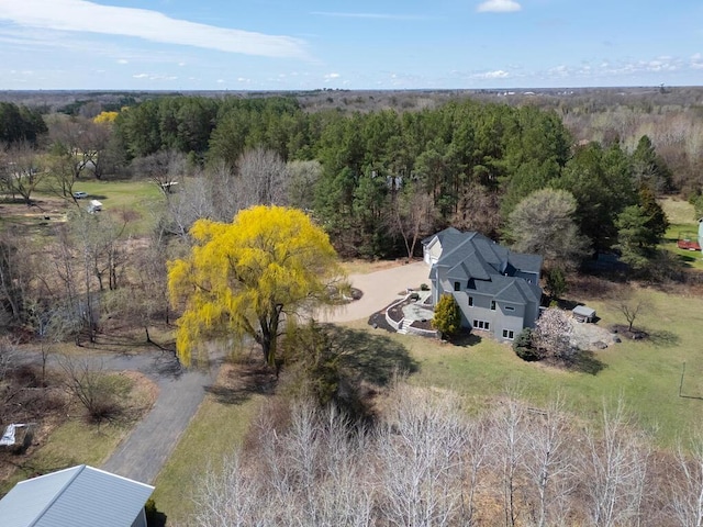 bird's eye view with a forest view