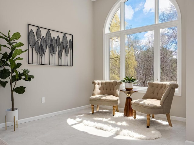 sitting room featuring baseboards
