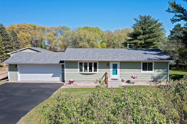 7830 Country Ln, Lino Lakes, MN 55014 - ranch-style home featuring driveway, roof with shingles, a garage, and entry steps