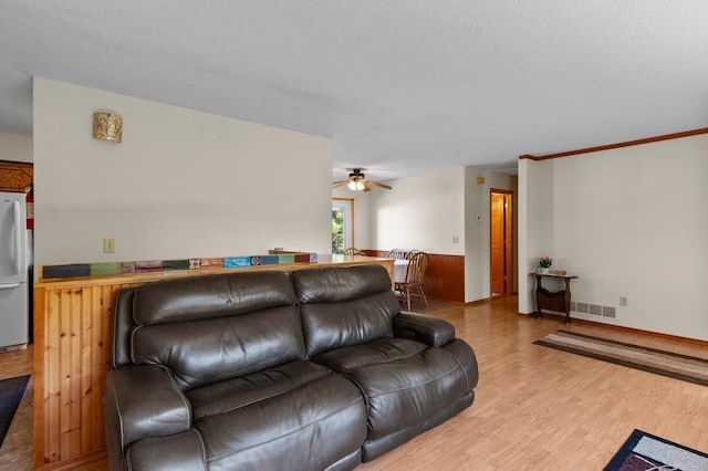 7830 Country Ln, Lino Lakes, MN 55014 - living room featuring ceiling fan and light wood-type flooring