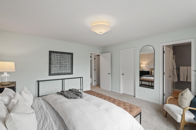 bedroom featuring light colored carpet
