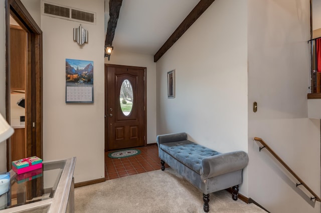 829 Church St, Saint Peter, MN 56082 - carpeted foyer with beamed ceiling and tile patterned flooring
