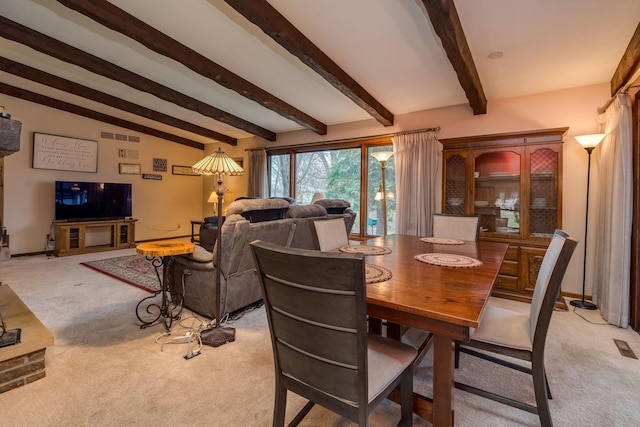 829 Church St, Saint Peter, MN 56082 - dining room with light colored carpet and beamed ceiling
