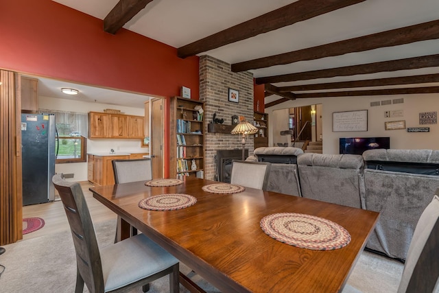 829 Church St, Saint Peter, MN 56082 - dining room featuring a brick fireplace