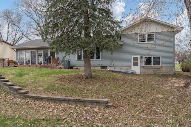 829 Church St, Saint Peter, MN 56082 - back of house featuring a sunroom and a yard