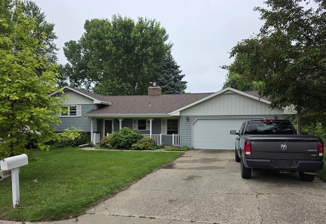 829 Church St, Saint Peter, MN 56082 - tri-level home featuring a garage, a front lawn, a chimney, covered porch, and driveway