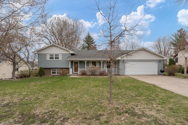 829 Church St, Saint Peter, MN 56082 - split level home with covered porch, a garage, concrete driveway, a front lawn, and a chimney