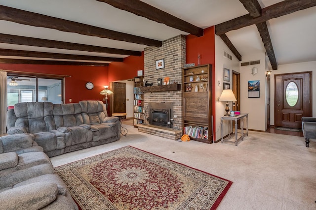 829 Church St, Saint Peter, MN 56082 - carpeted living area featuring beam ceiling, a brick fireplace, and ceiling fan