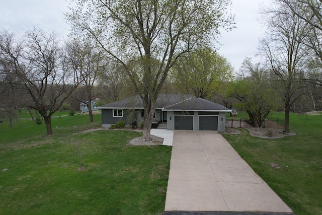 200 Lily Dr, Decoria Twp, MN 56001 - ranch-style home with a garage, a front lawn, and driveway