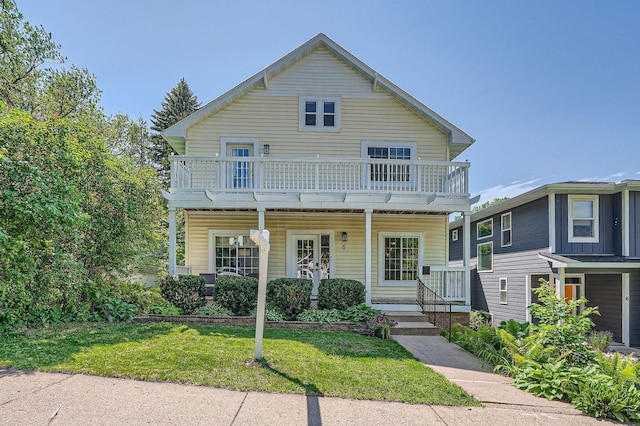 8 Queen Ave S, Minneapolis, MN 55405 - view of front facade featuring a front yard and a porch