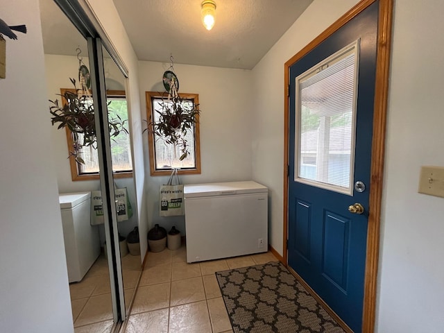 14879 Benson Rd, Grantsburg, WI 54840 - laundry room with laundry area and light tile patterned floors