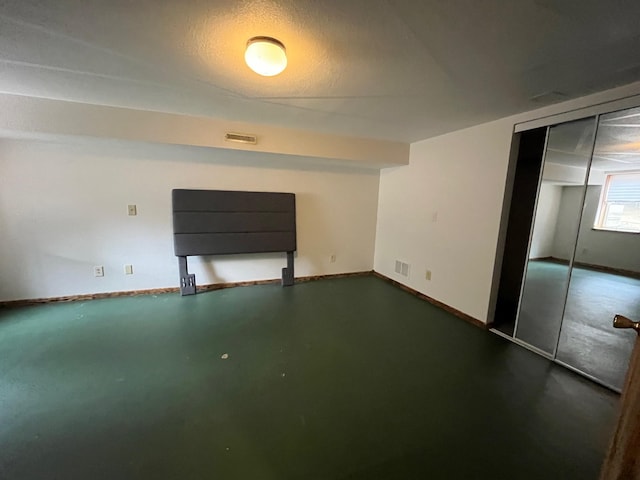 14879 Benson Rd, Grantsburg, WI 54840 - below grade area featuring baseboards and visible vents